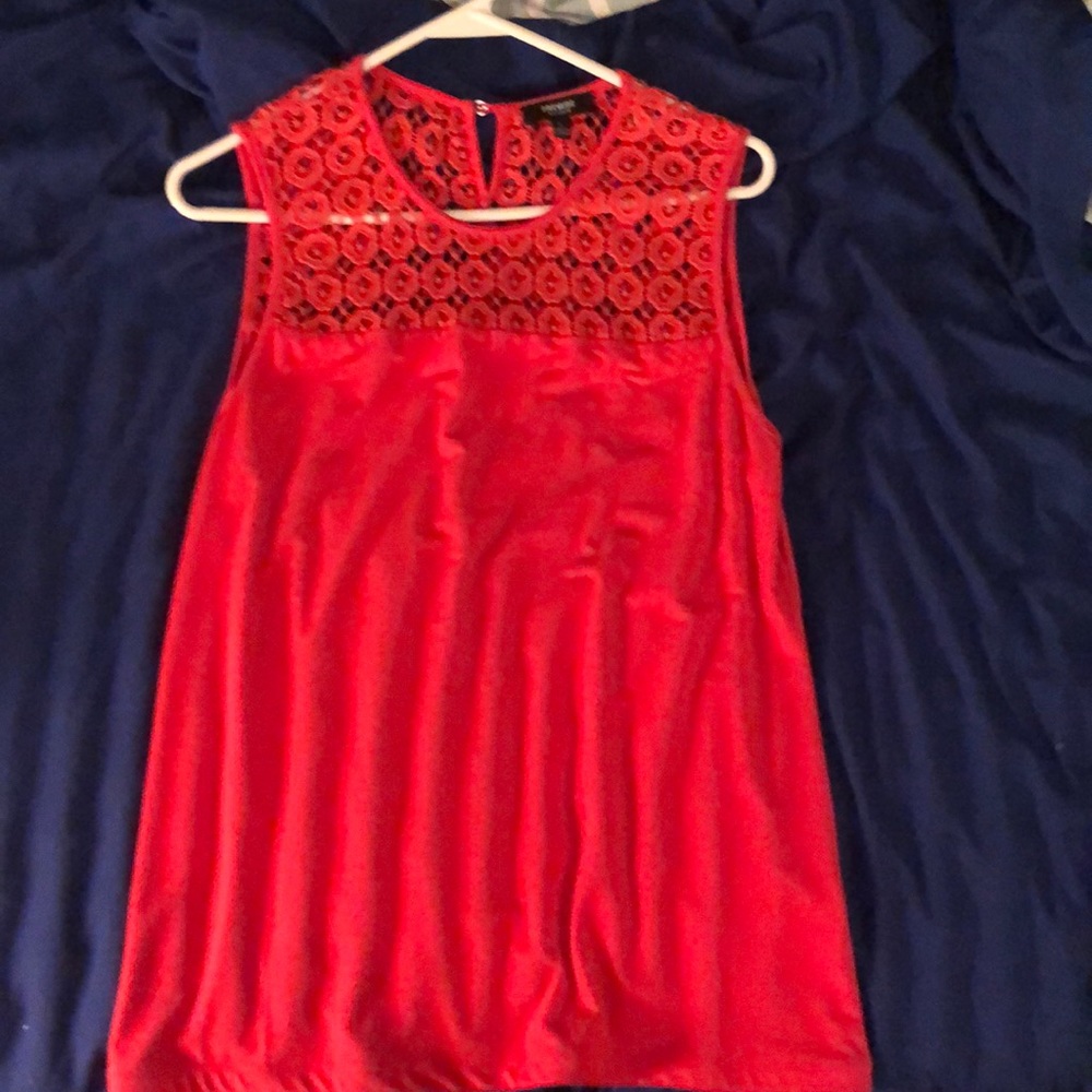 Sleeveless orange blouse